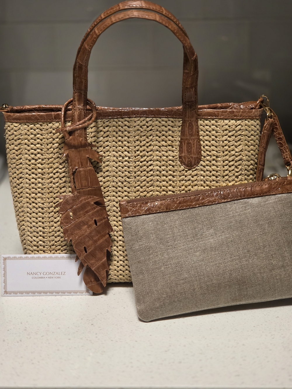Nancy Gonzalez Natural Straw Tote with Brown Crocodile Trim and Pouch.